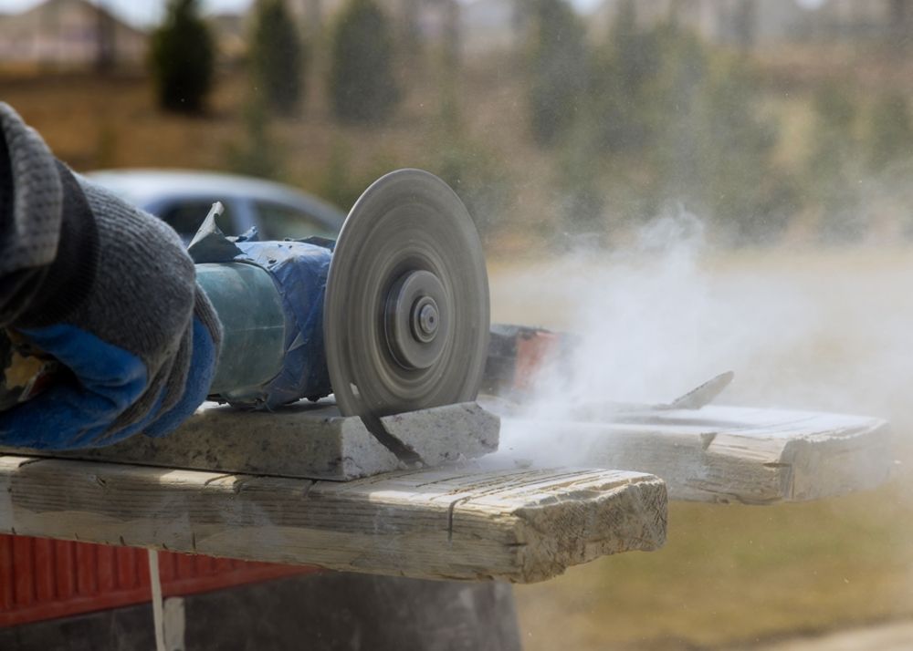 Dust from cutting marble stone with an diamond saw.